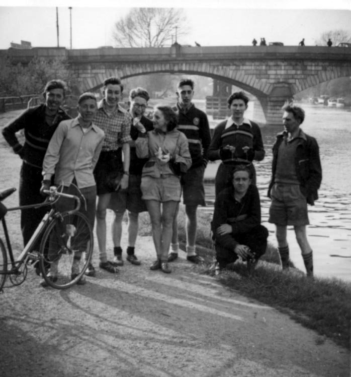 Tea at Staines. From left to right: Ken Dopson, ?, myself, Jimmy Jack, Shiela Johns, Roger Bingham, Len Chapman (standing), Bob Harvey and Tom Simpson.